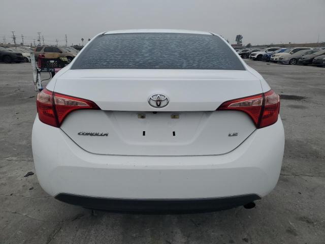 VIN 5YFBURHE8JP822098 2018 Toyota Corolla, L no.6