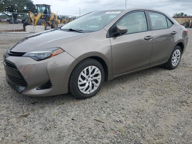 VIN 5YFBURHEXJP856074 2018 Toyota Corolla, L no.1