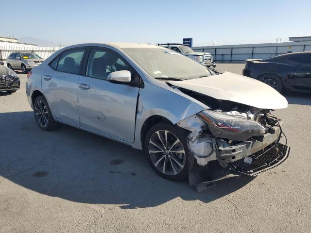 VIN 5YFBURHE6HP627921 2017 Toyota Corolla, L no.4