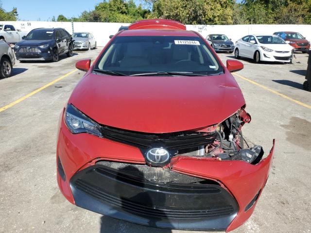 VIN 5YFBURHE3KP911921 2019 Toyota Corolla, L no.5