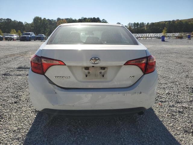 VIN 5YFBURHEXJP738963 2018 Toyota Corolla, L no.6