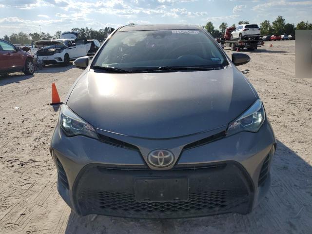 VIN 5YFBURHE7JP818642 2018 Toyota Corolla, L no.5