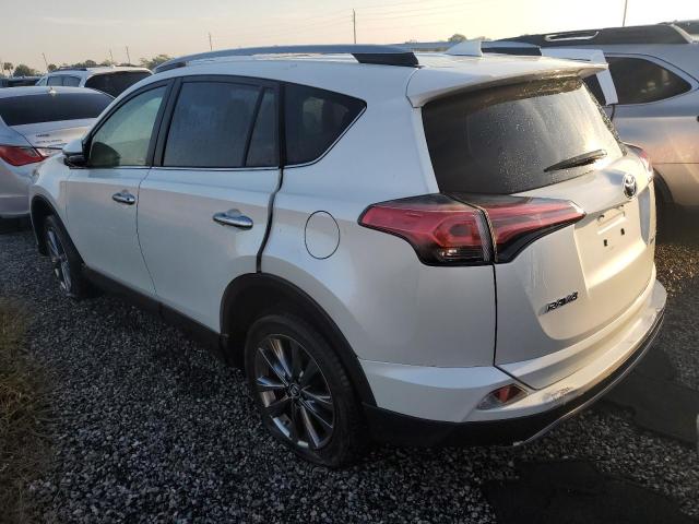 VIN JTMYFREVXJJ168203 2018 Toyota RAV4, Limited no.2