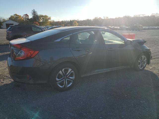 Vin: 2hgfc2f52jh505200, lot: 77802764, honda civic lx 20183