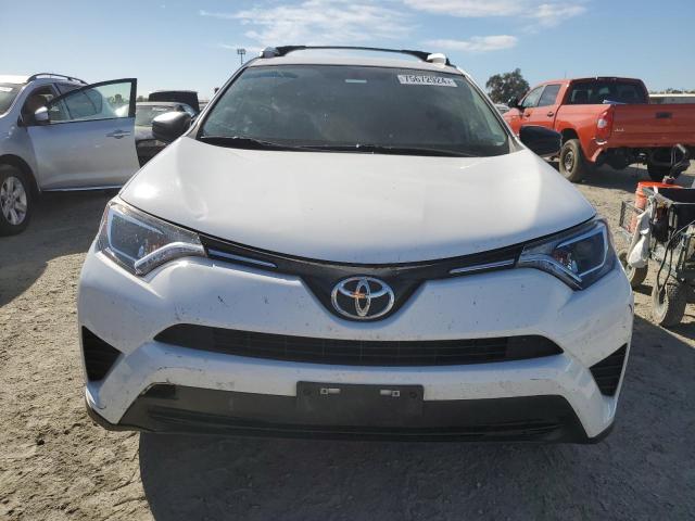 VIN 2T3ZFREV6GW290555 2016 Toyota RAV4, LE no.5