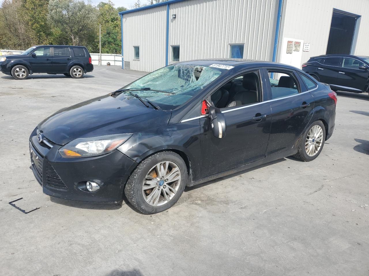 Lot #3263694708 2014 FORD FOCUS TITA
