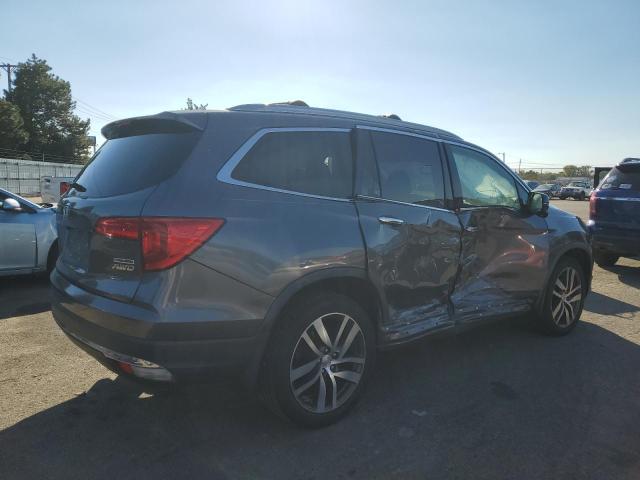 2016 HONDA PILOT TOURING 5FNYF6H97GB123717