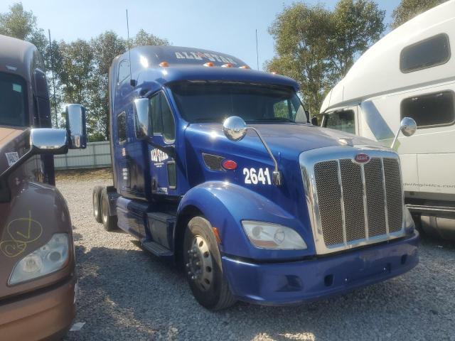 Global Auto Auctions: 2015 PETERBILT TRACTOR 587