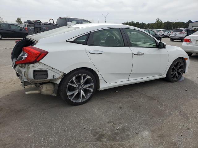 2019 HONDA CIVIC TOUR JHMFC1F98KX000351