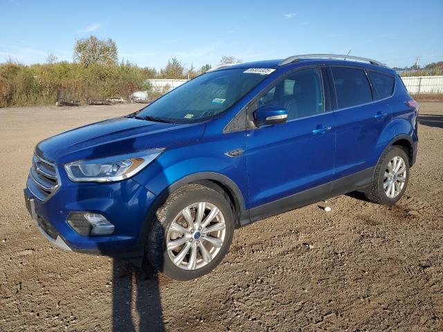 Global Auto Auctions: 2017 FORD ESCAPE TIT