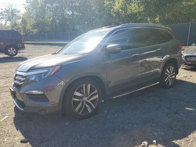 2018 HONDA PILOT ELITE 5FNYF6H04JB039248