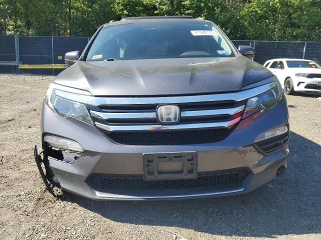 2018 HONDA PILOT ELITE 5FNYF6H04JB039248