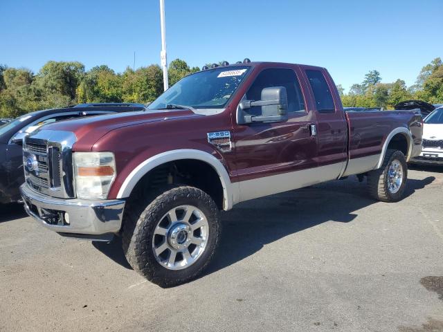 FORD F350 SUPER 2010 burgundy 4dr ext diesel 1FTWX3BR9AEA26023 photo #1