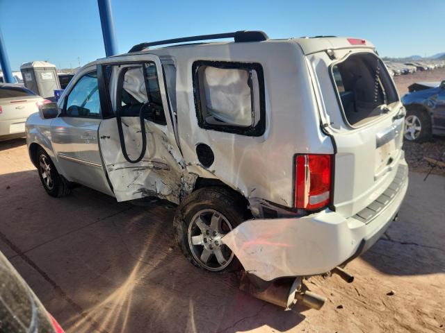 2011 HONDA PILOT TOUR - 5FNYF4H9XBB074039