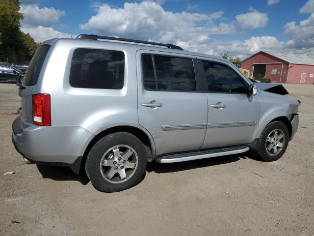 2011 HONDA PILOT TOUR - 5FNYF4H95BB058766