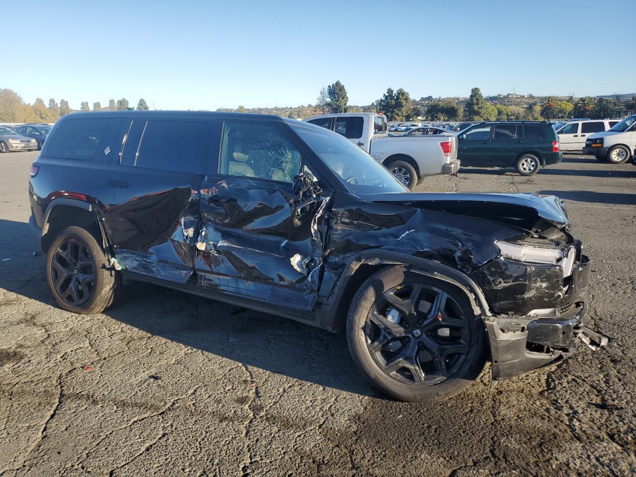 Lot #3302030132 2025 RIVIAN R1S ADVENT