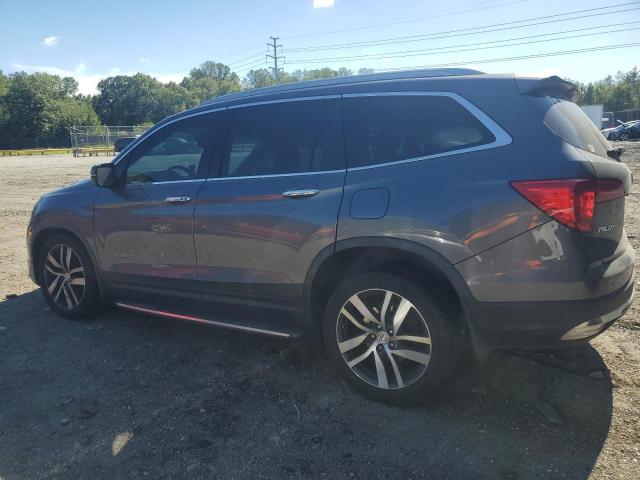 2018 HONDA PILOT ELITE 5FNYF6H04JB039248