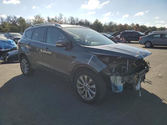 2017 FORD ESCAPE TIT 1FMCU9J90HUA44602