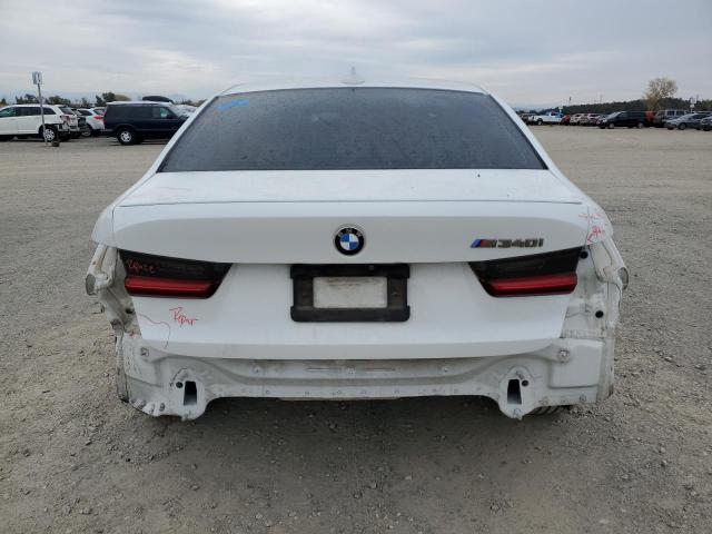 3MW5U7J07L8B25392 BMW M3 40I 5