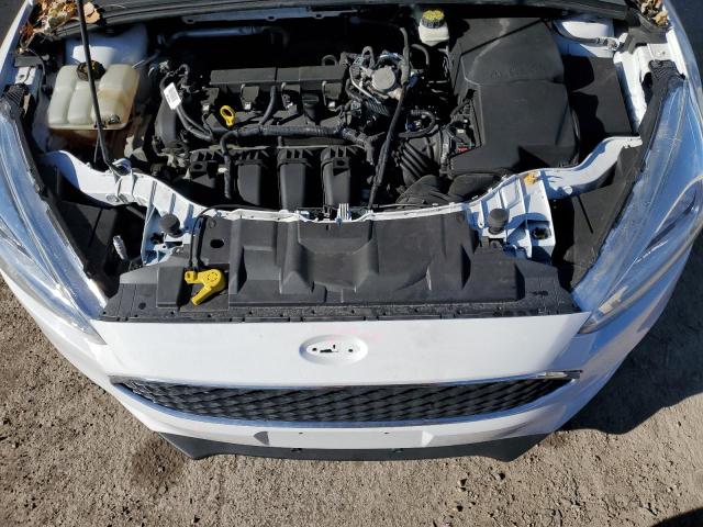 2017 Ford Focus Se VIN: 1FADP3F23HL210695 Lot: 77032103