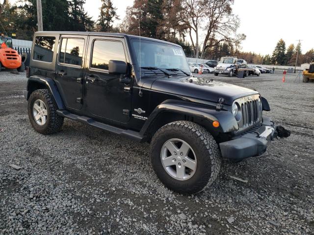 1C4BJWDG7EL165453 Jeep Wrangler Unlimited Sport