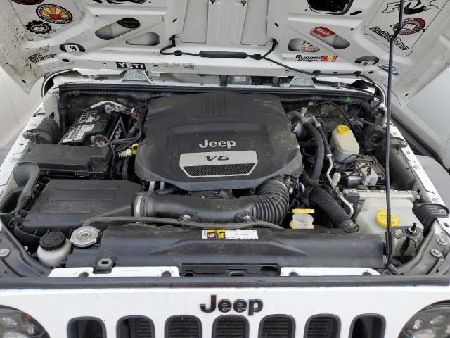 1C4AJWBG7FL637991 Jeep Wrangler Sahara