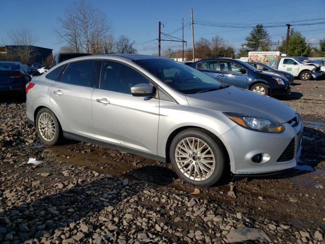 2013 Ford Focus Titanium VIN: 1FADP3J29DL207107 Lot: 77909693