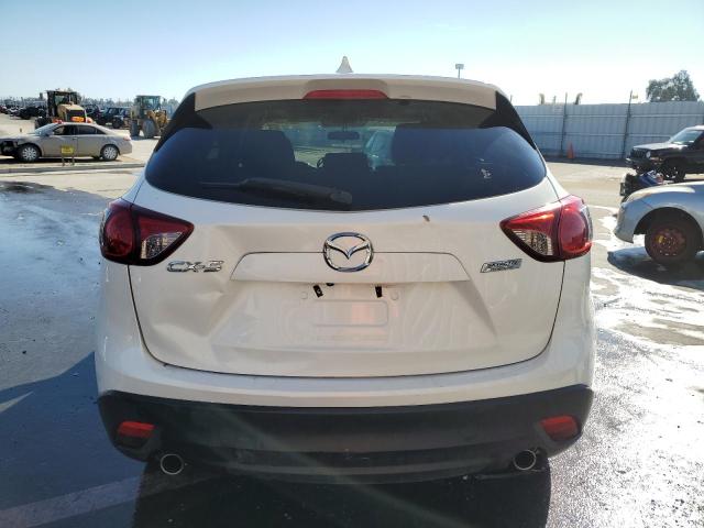 2014 Mazda Cx-5 Touring VIN: JM3KE2CYXE0315510 Lot: 79739433