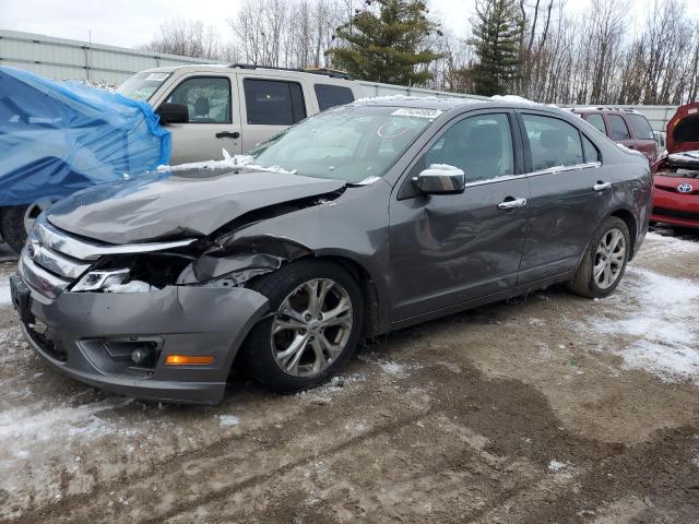 Lot #2443452849 2012 FORD FUSION SE salvage car