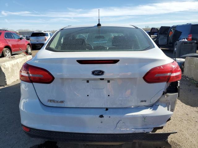 2017 Ford Focus Se VIN: 1FADP3F23HL210695 Lot: 77032103