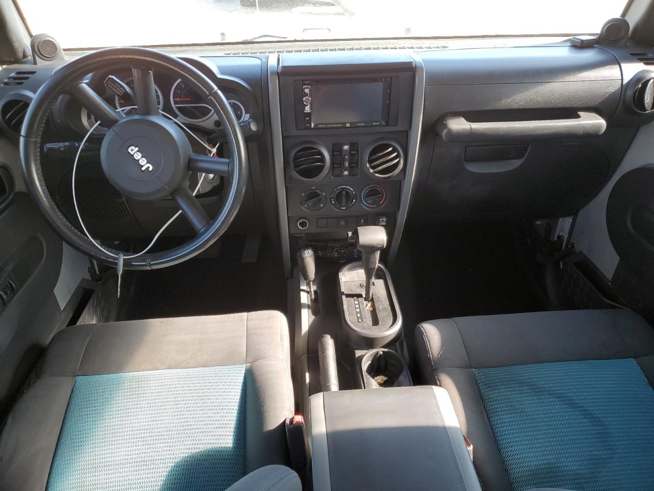 1j4ha3h11al174085 1J4HA3H11AL174085 2010 Jeep Wrangler Unlimited Sport