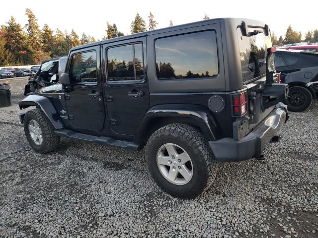 1C4BJWDG7EL165453 Jeep Wrangler Unlimited Sport