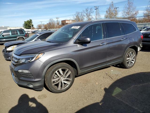 2018 HONDA PILOT ELIT - 5FNYF6H04JB049598
