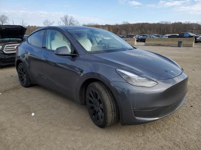 VIN 7SAYGDEE1PA195046 2023 TESLA MODEL Y no.4