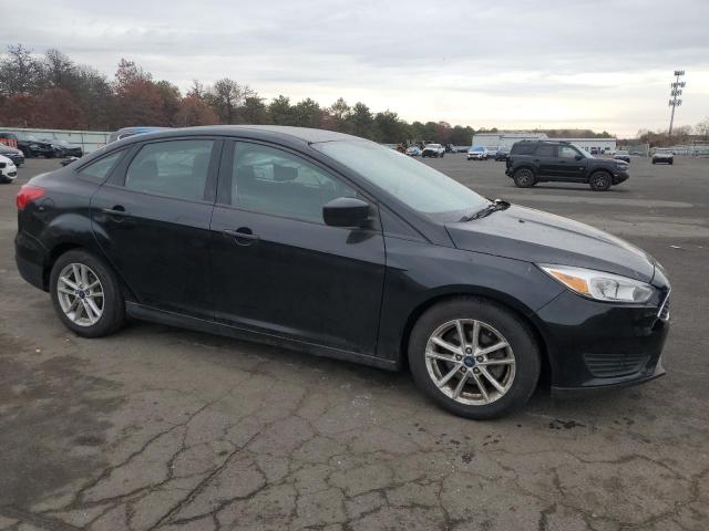 VIN 1FADP3F21JL306959 2018 Ford Focus, SE no.4