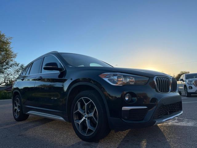 BMW X1 XDRIVE2 2017 black 4dr spor gas WBXHT3C30H5F78881 photo #1