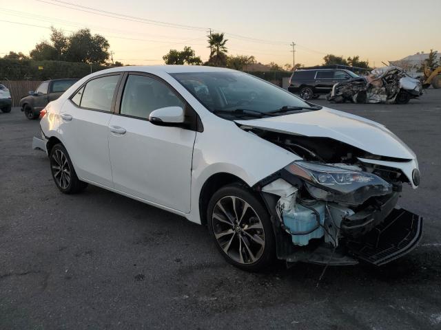 VIN 5YFBURHE8KP856379 2019 Toyota Corolla, L no.4