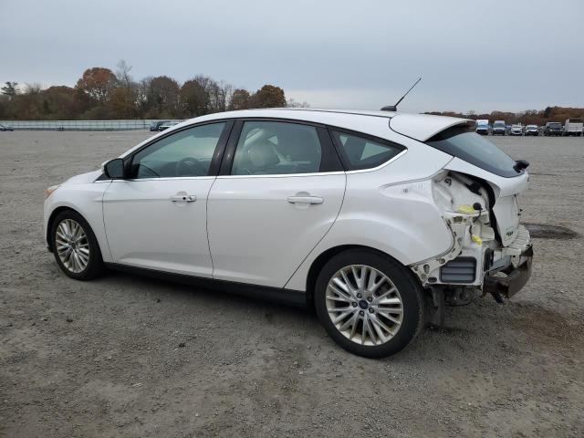 VIN 1FADP3N27JL325176 2018 Ford Focus, Titanium no.2