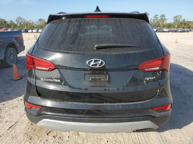 VIN 5NMZU3LB8JH057087 2018 HYUNDAI SANTA FE no.6