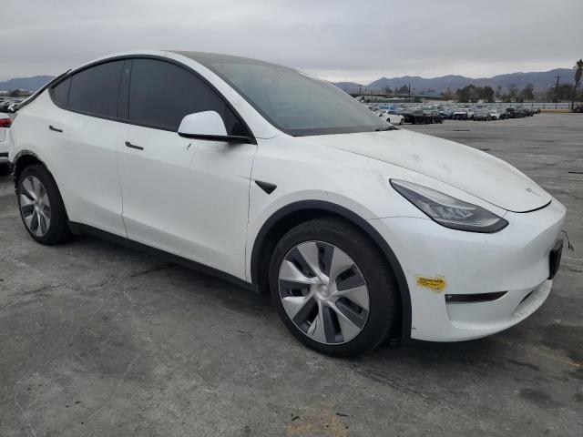 VIN 7SAYGAEE8NF341506 2022 TESLA MODEL Y no.4