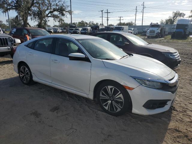 VIN 2HGFC1F37HH657704 2017 Honda Civic, EX no.4