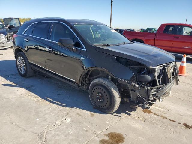 VIN 1GYKNCRS0KZ112080 2019 CADILLAC XT5 no.4