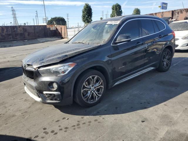 VIN WBXHT3C35G5E56709 2016 BMW X1 no.1