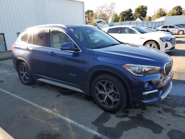 VIN WBXHT3C39J5F90128 2018 BMW X1 no.4