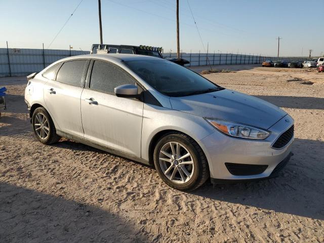 VIN 1FADP3FEXJL222617 2018 Ford Focus, SE no.4