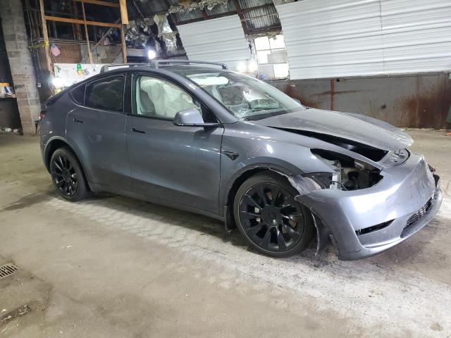 VIN 7SAYGAEE7PF698212 2023 TESLA MODEL Y no.4