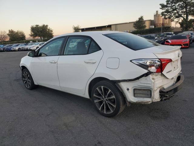 VIN 5YFBURHE8KP856379 2019 Toyota Corolla, L no.2