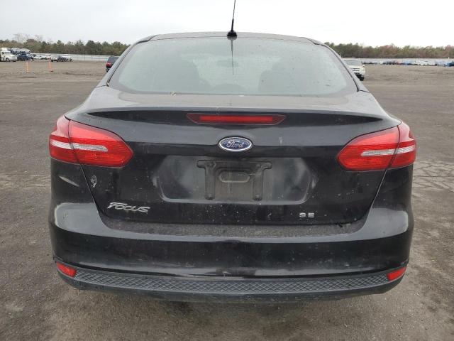 VIN 1FADP3F21JL306959 2018 Ford Focus, SE no.6