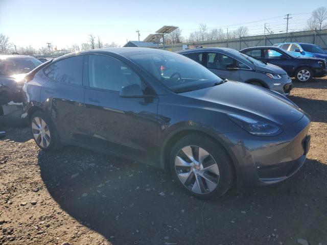 VIN 7SAYGDEEXPF854017 2023 Tesla MODEL Y no.4