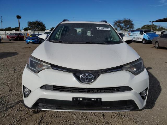 VIN JTMWFREV4GJ073975 2016 TOYOTA RAV4 no.5